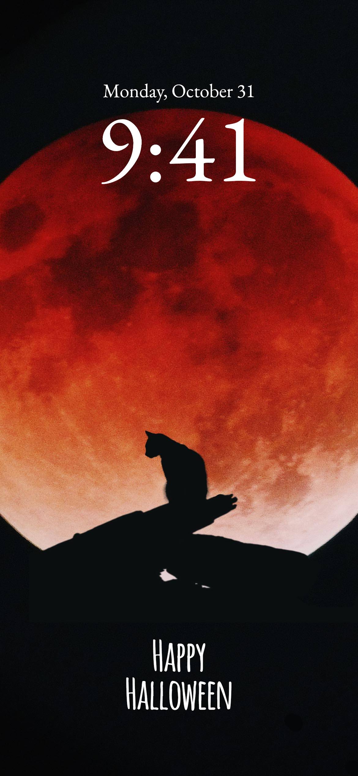 a red moon and a wolf on a halloween dark night