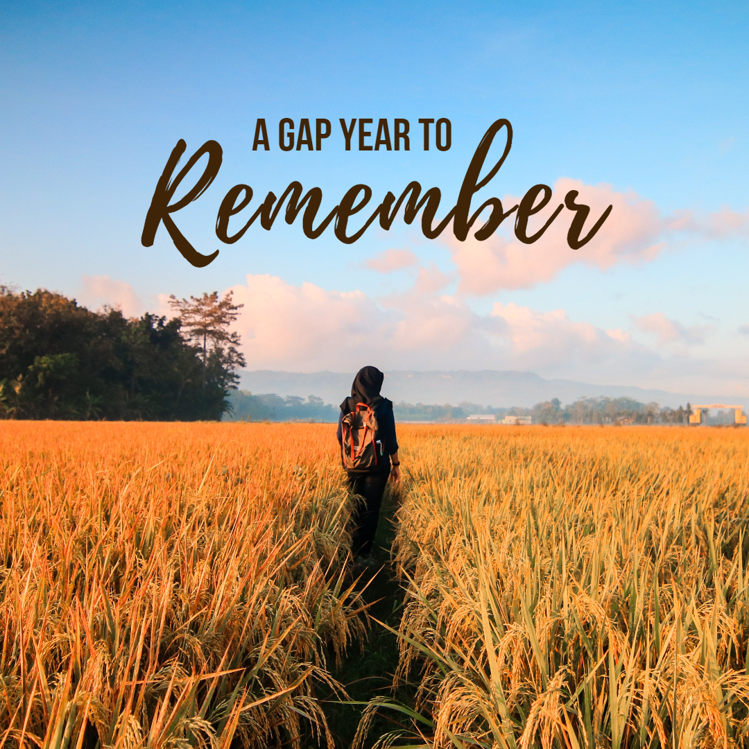 a gap year vacation post with a woman standing in a wheat field.