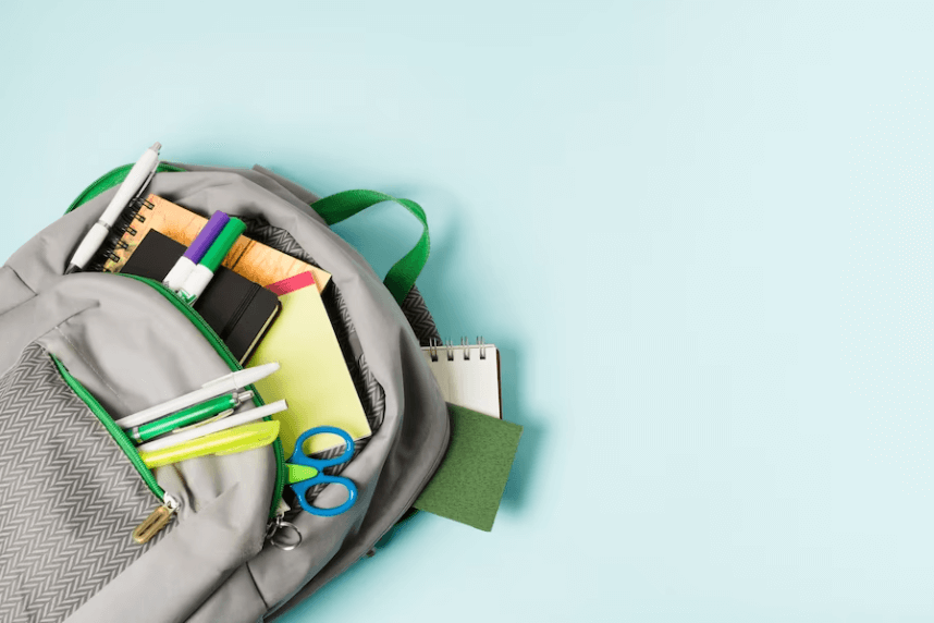 stationery in a gray school bag