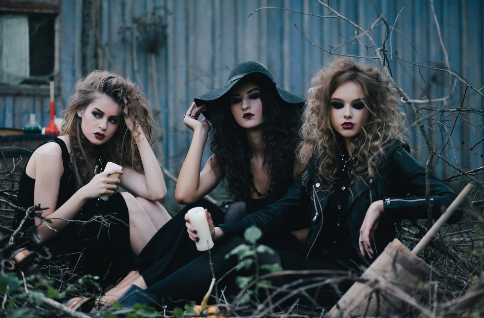Three women in cool witch makeup