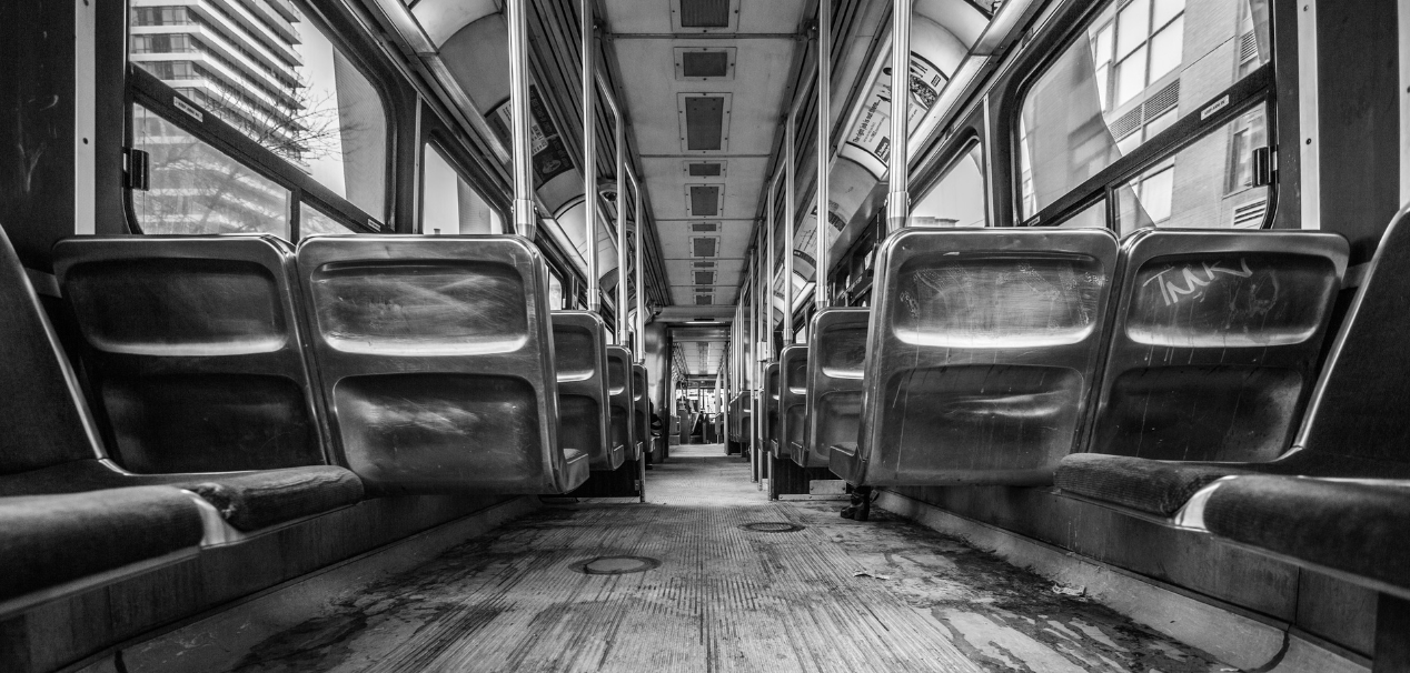 a black and white photo of bus