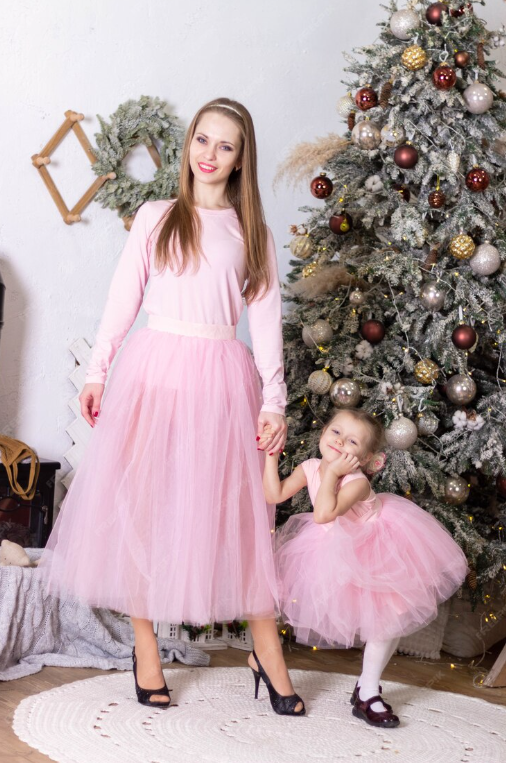 a mother and daughter with pink evening dress