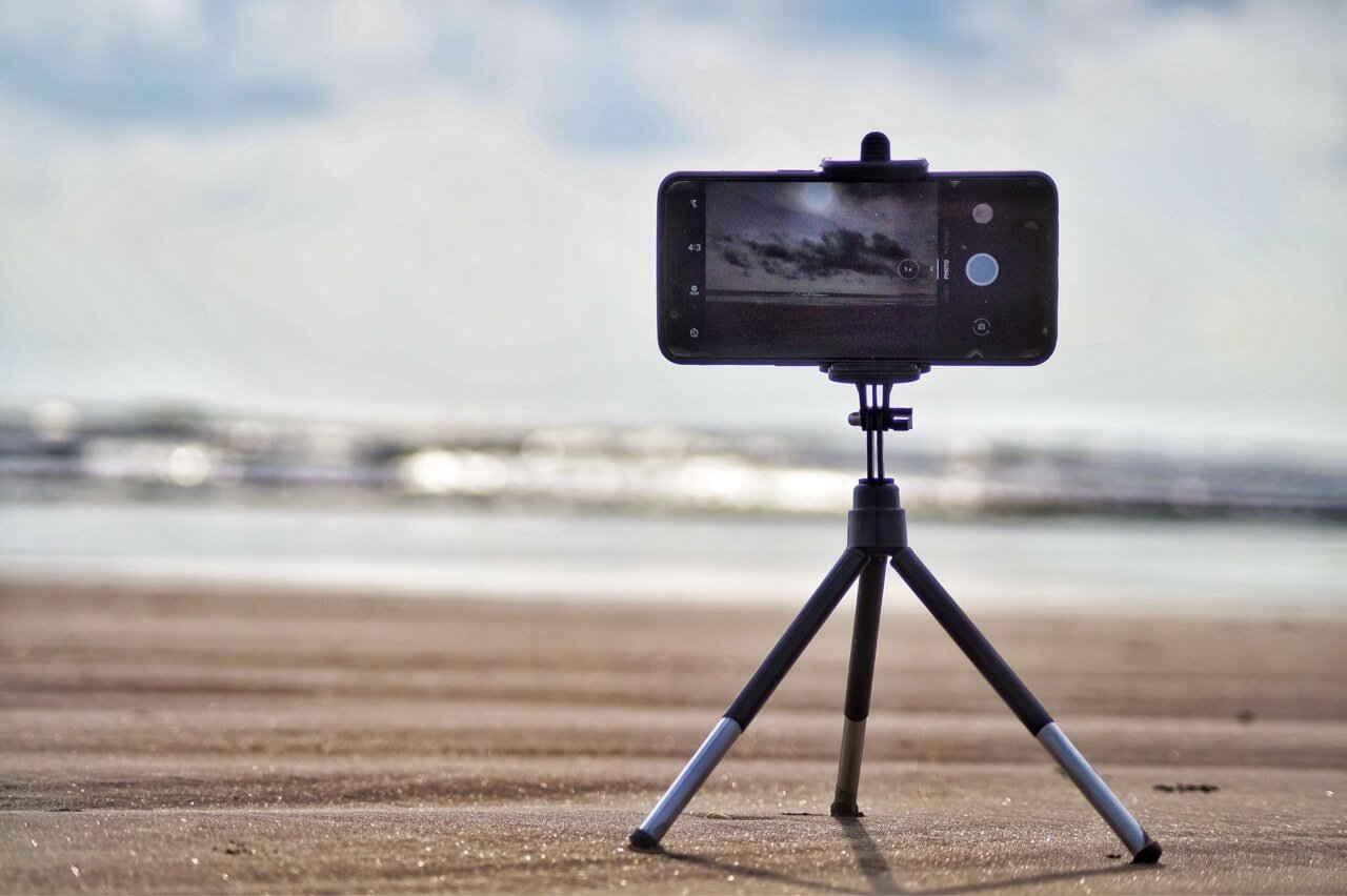 a tripod with a smartphone