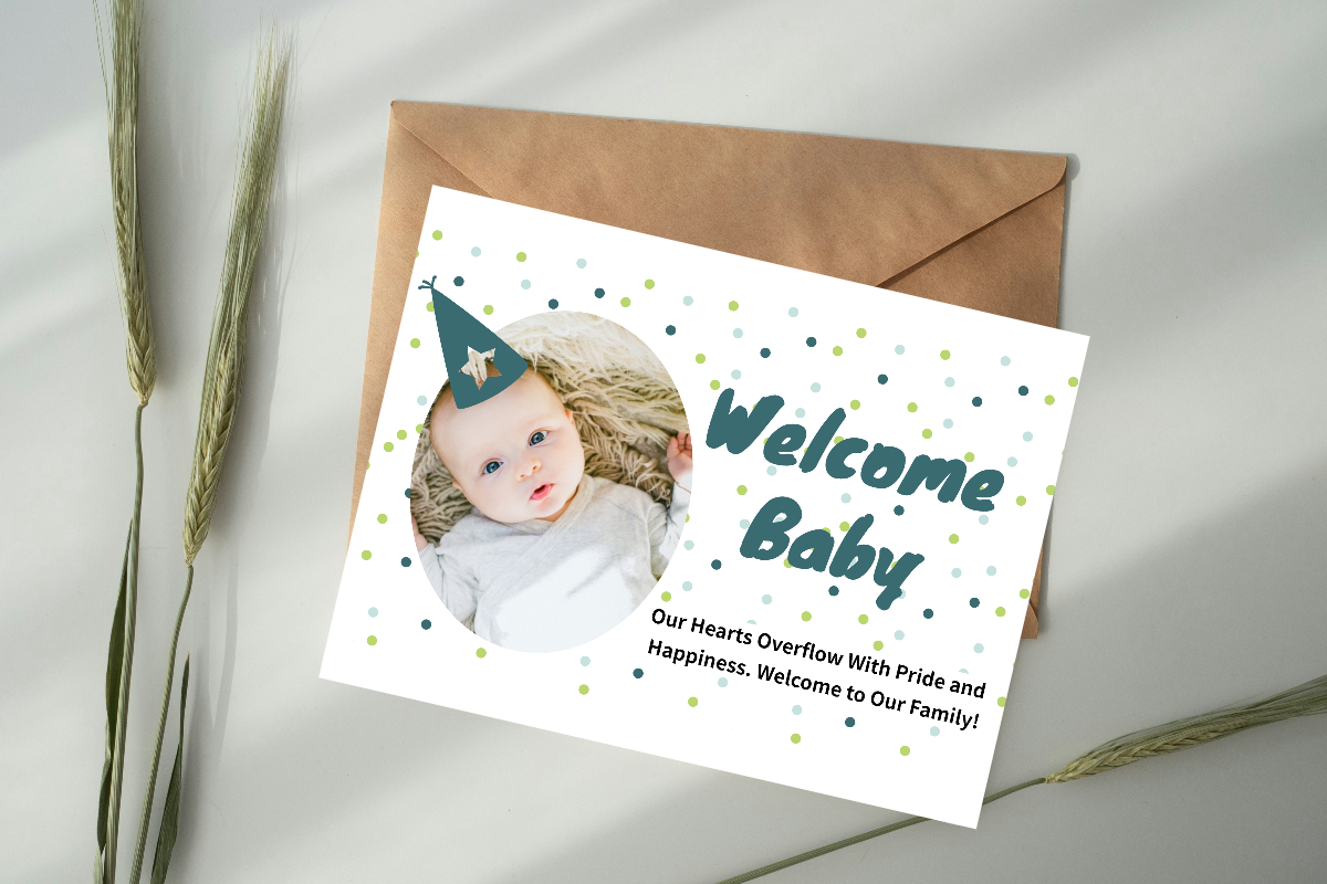 a welcome baby card on desk