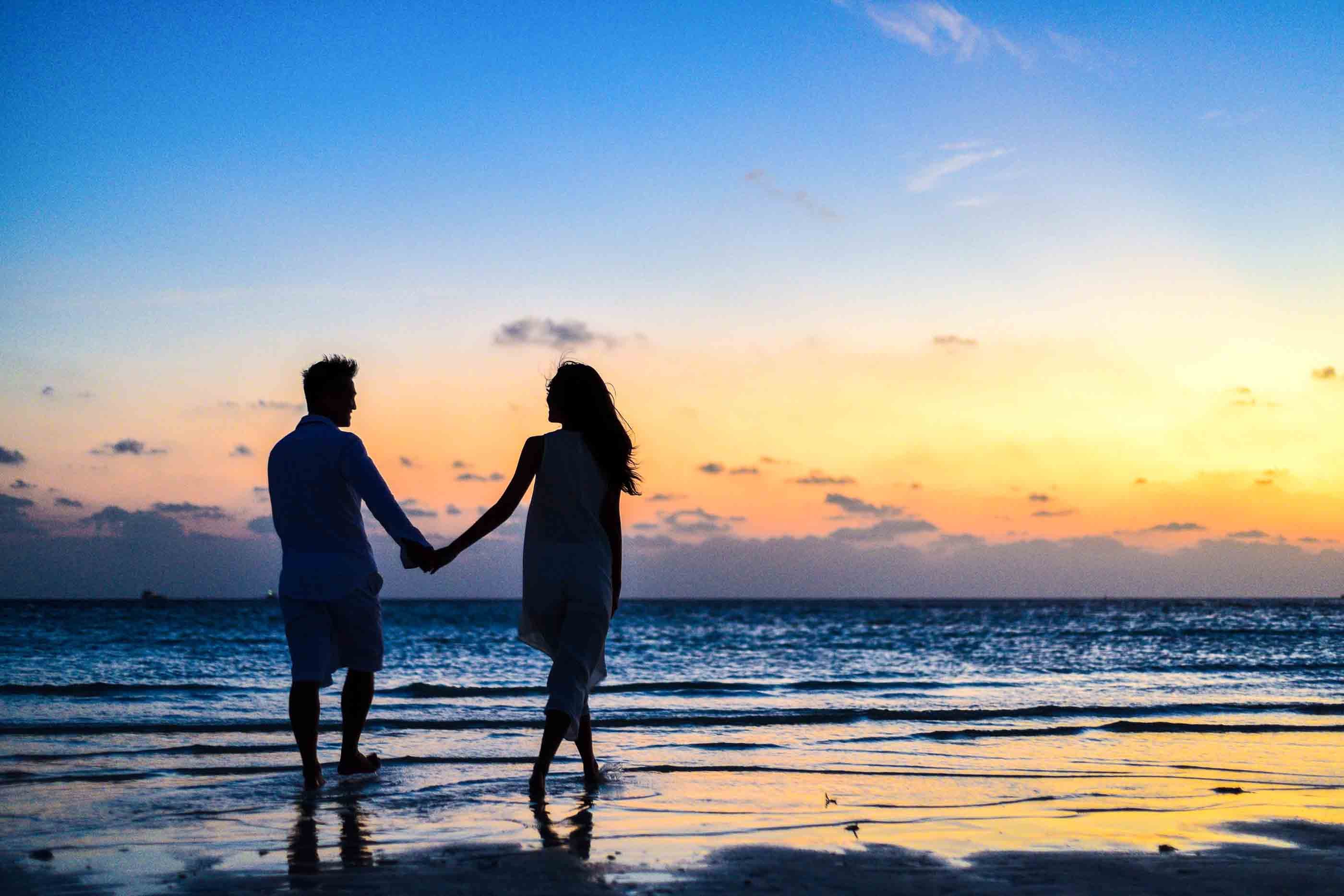 an instagram styled couple photo on the beach