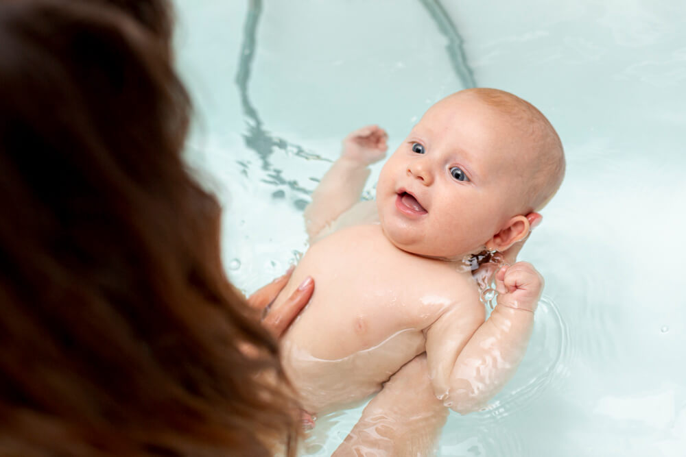 bath a smiley newborn