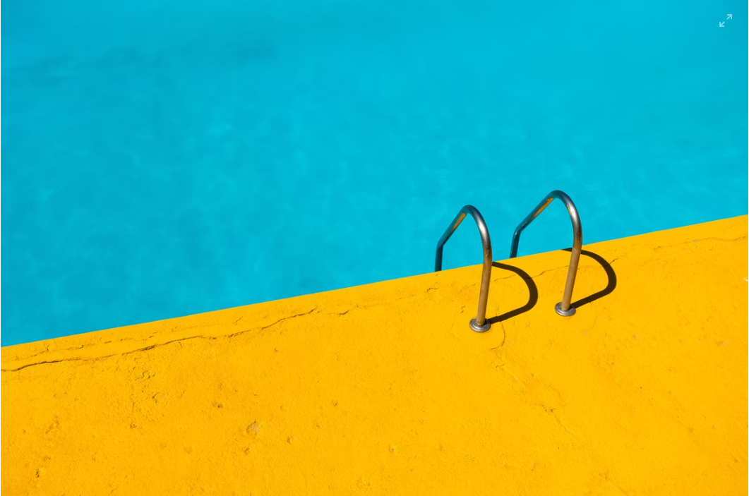 yellow and blue swimming pool land