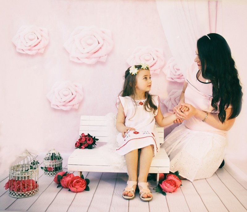 a family valentine photoshoot of a female and her kid