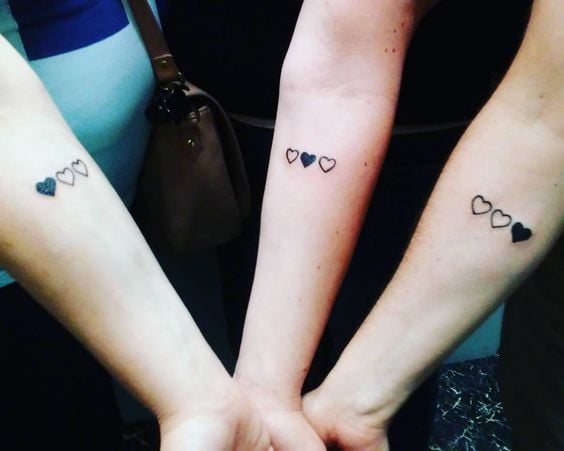 family tattoo for brothers with three hearts