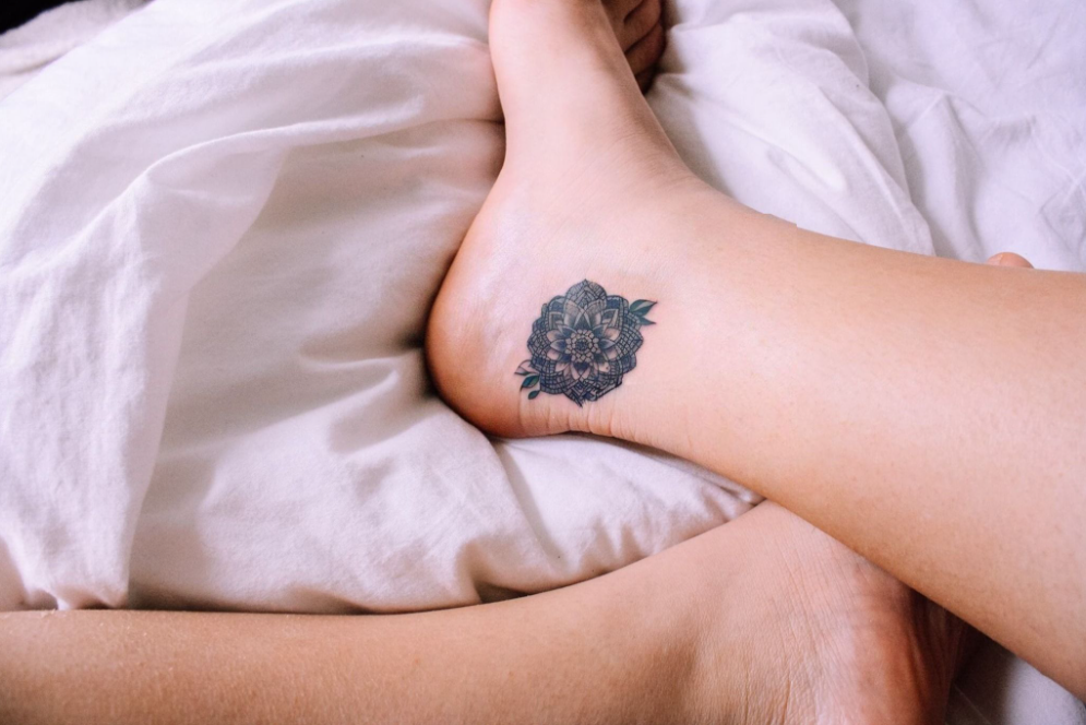 flower tattoo on ankle