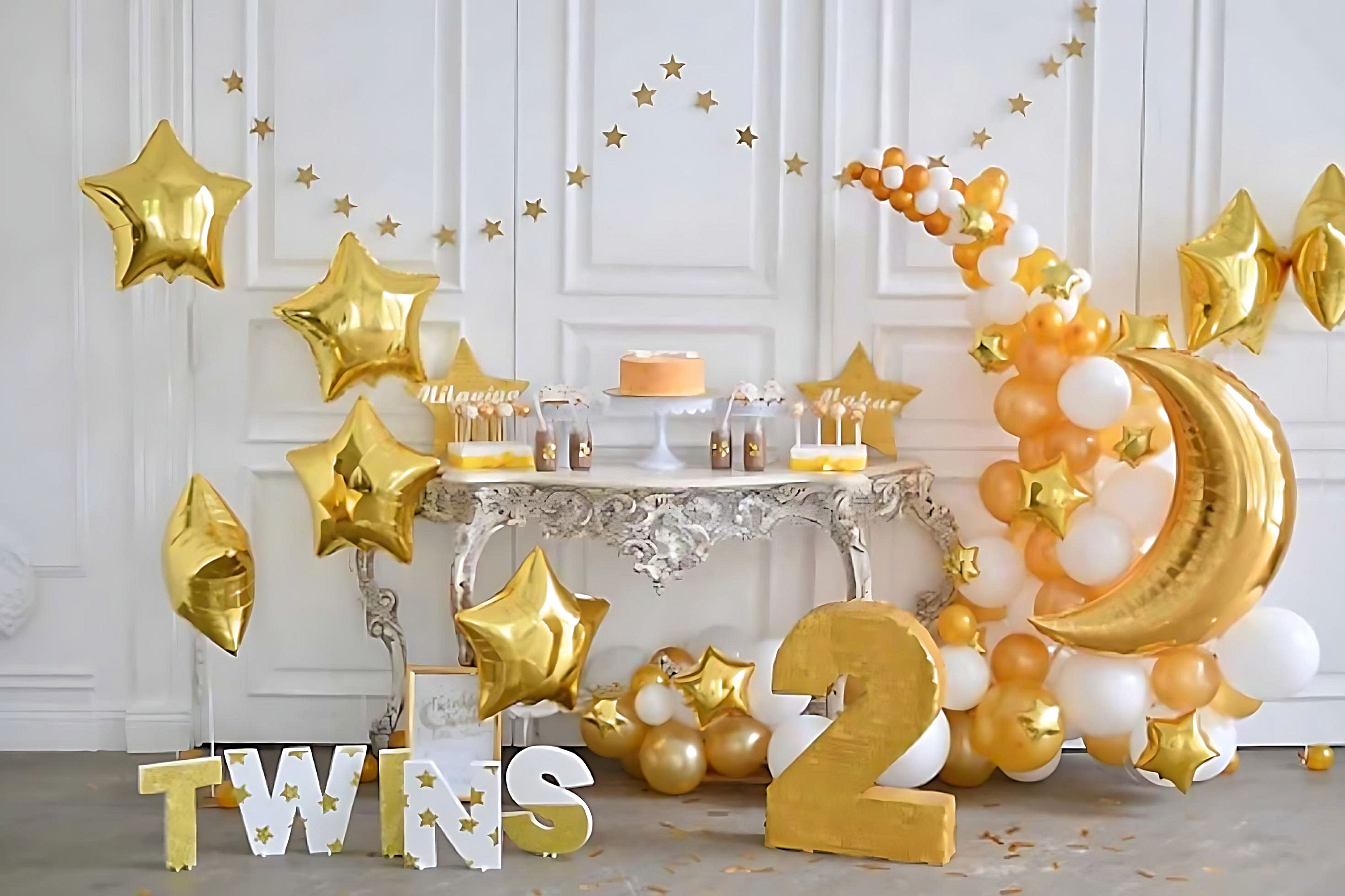 golden twins birthday backdrop with balloon