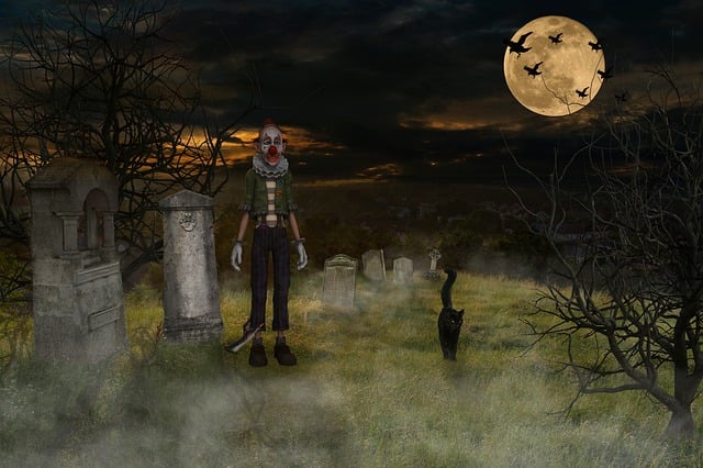 A man and a cat standing in the graveyard