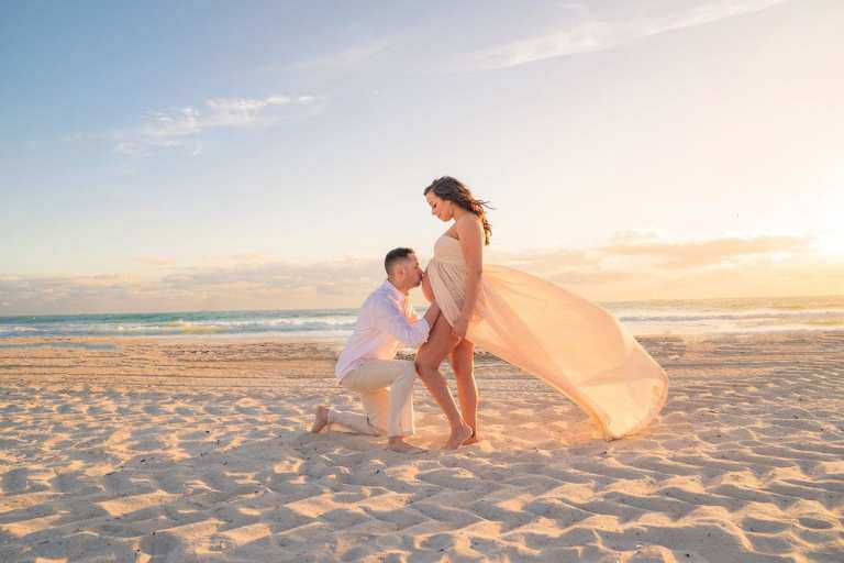 maternity image with husband on the beach