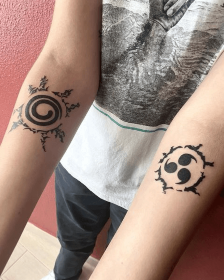 naruto character anime tattoo on both arms