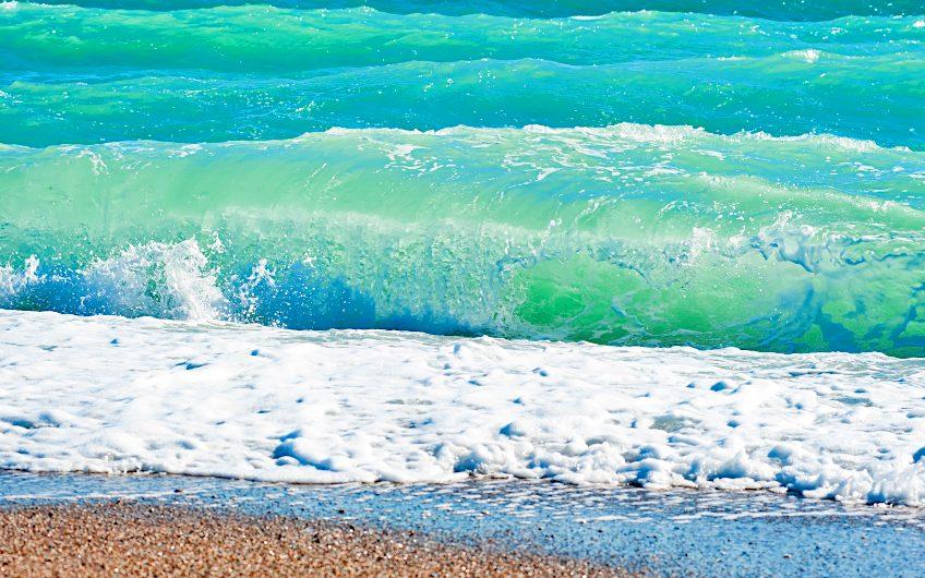 ocean waves with seafoam color