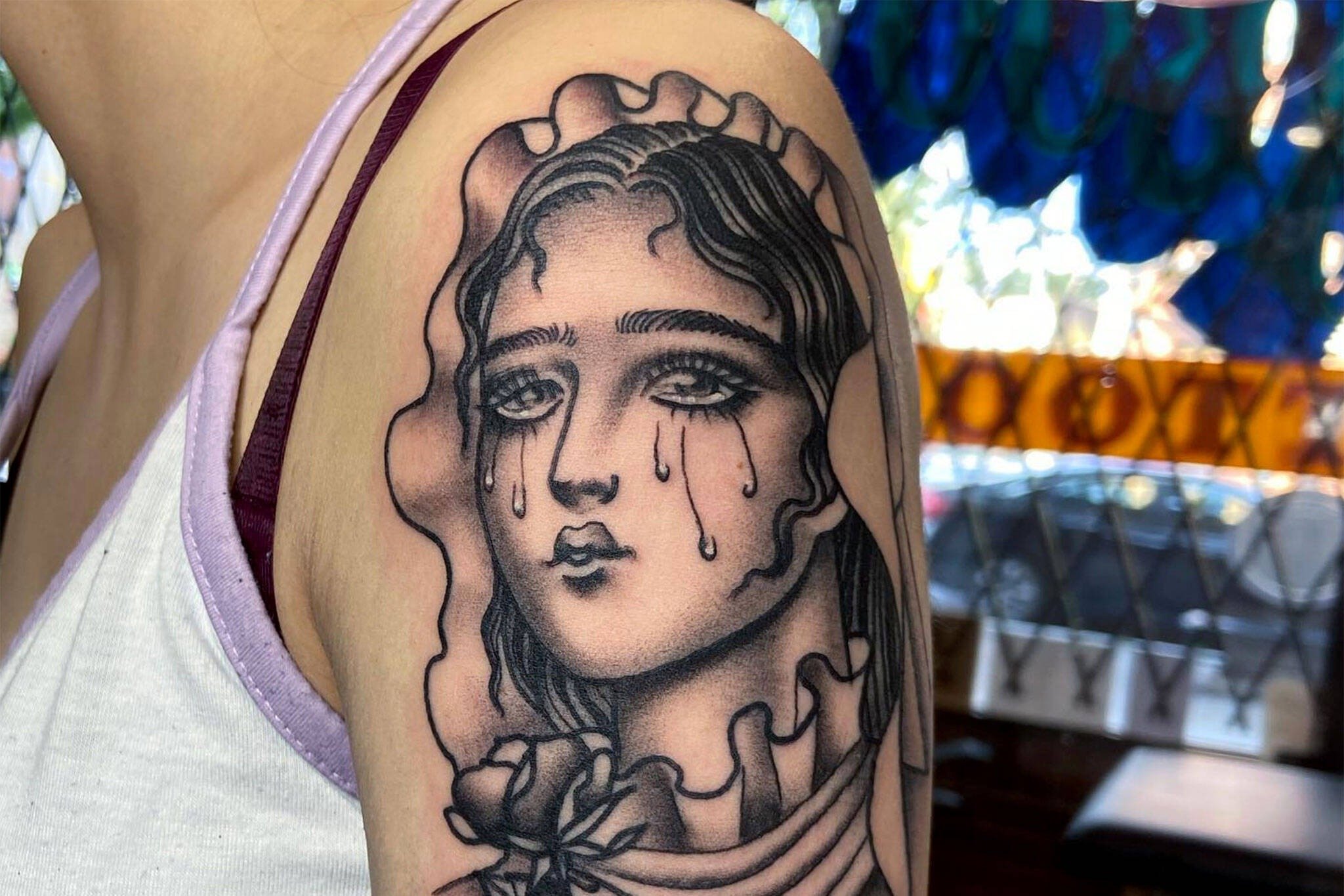 portrait tattoo on arm
