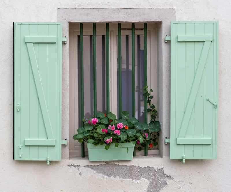 seafoam green on the wood windows