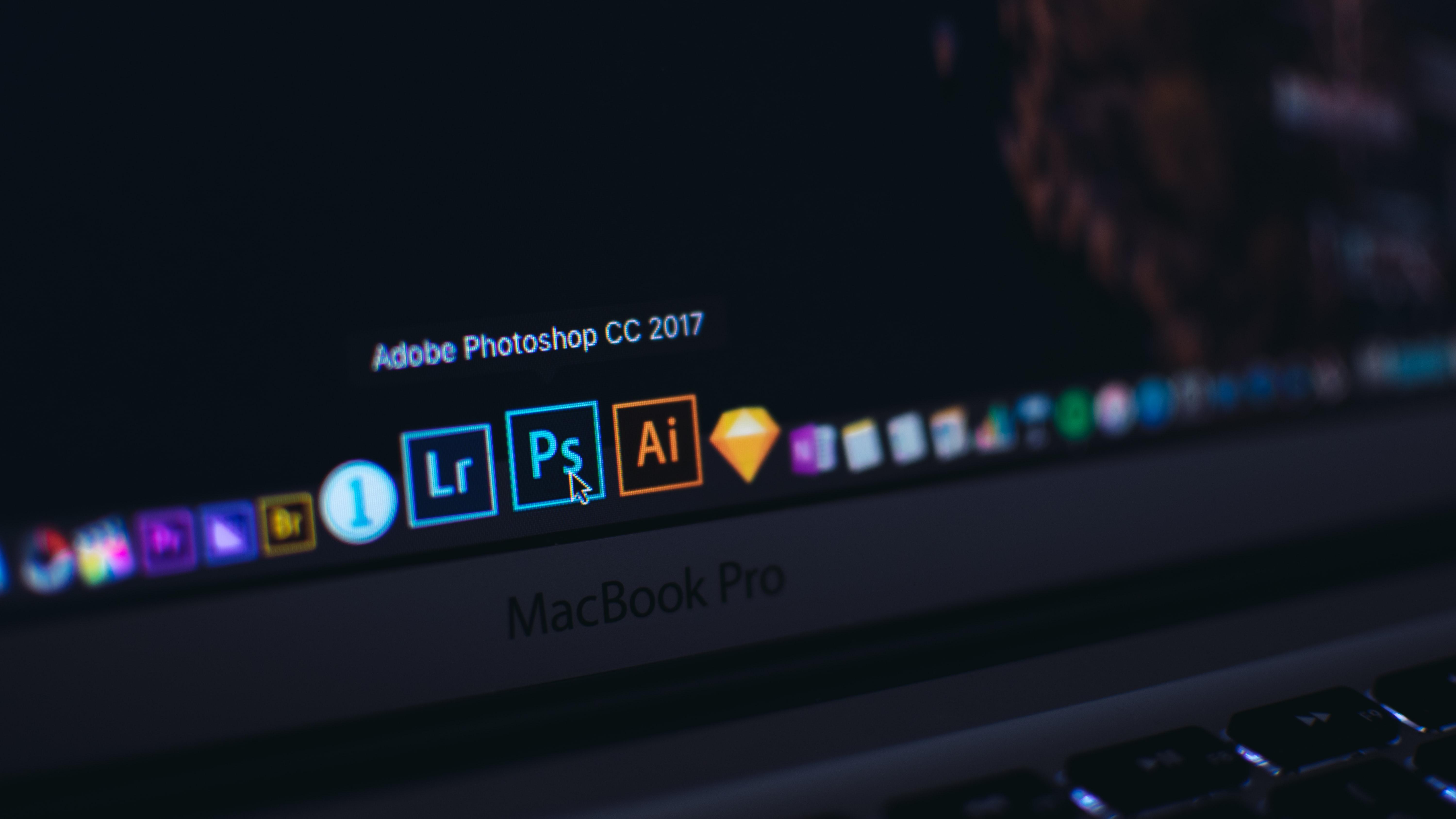 select photoshop program in a laptop