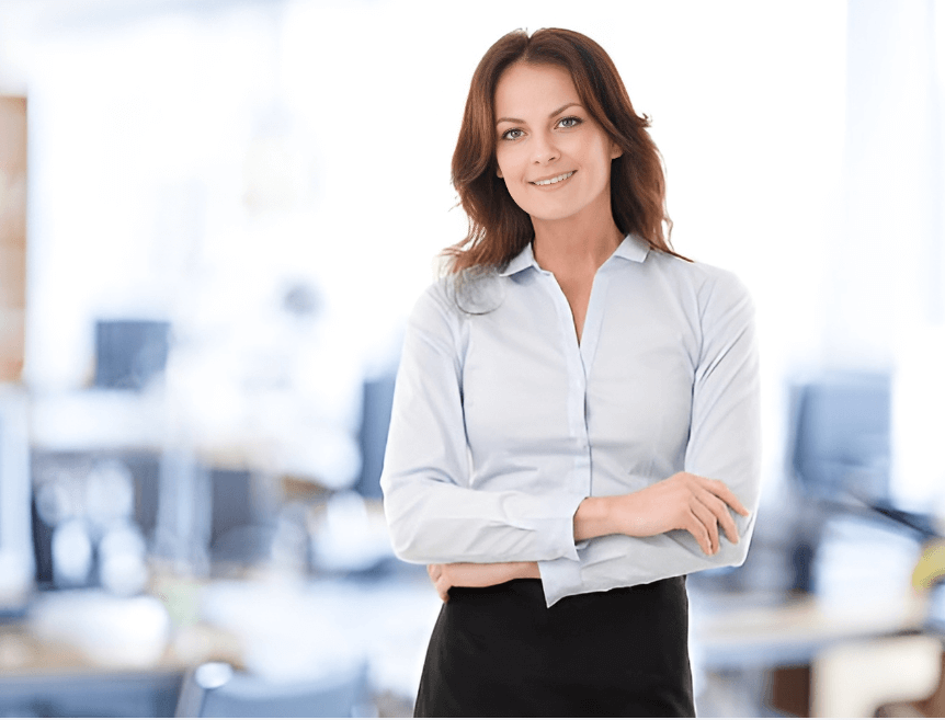 A lady stands up straight, directly facing the camera.