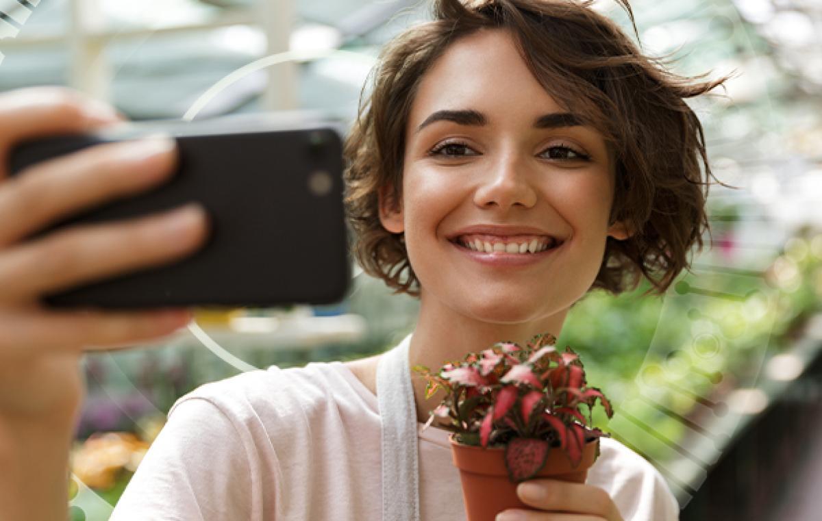 enjoy taking selfie with flower