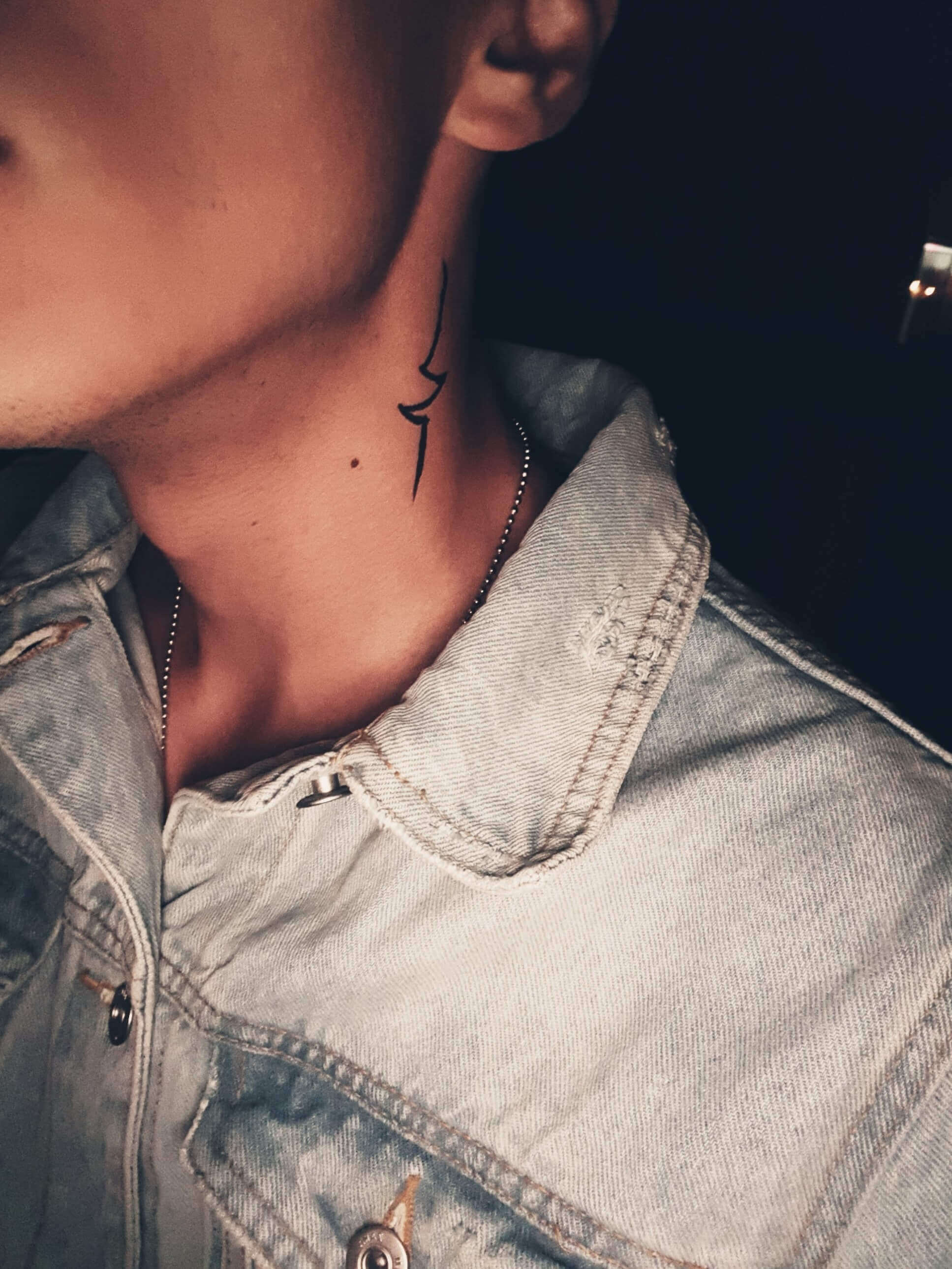 thunder tattoo on neck
