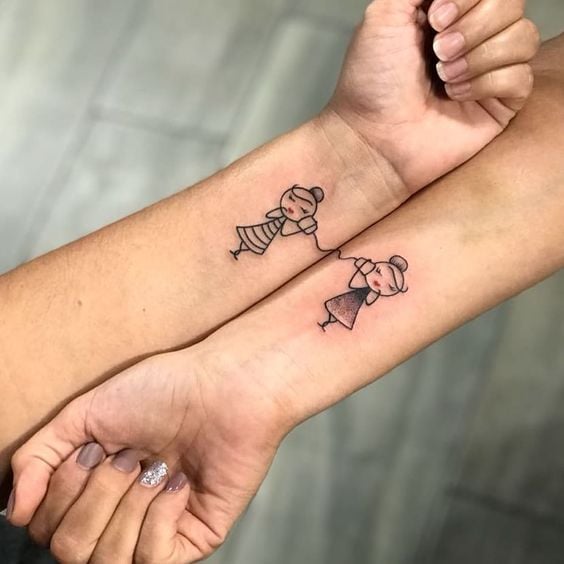 two cute girls tattoo