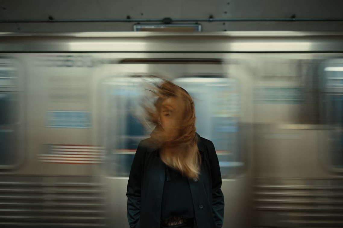 woman in motion blur effect on the subway