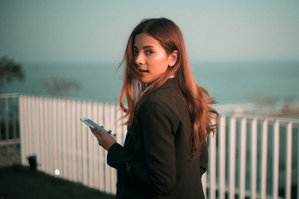 woman look back to camera pose