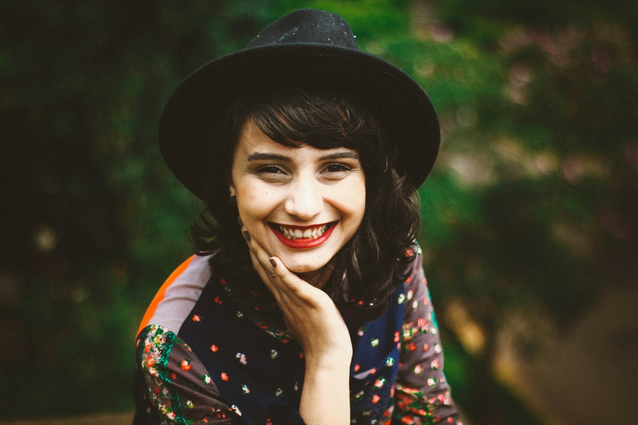 woman smiling with red lipstick