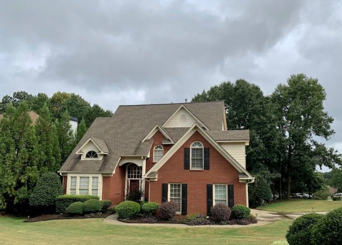Exterior photo of a house in a suburban neighborhood