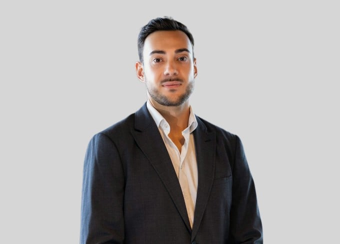 Portrait photo with background replaced using a clean gradient studio style backdrop