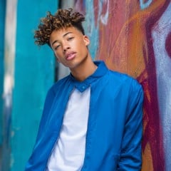 A black boy against a wall thumbnail