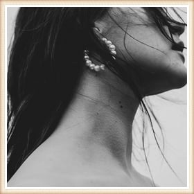 Add a classy frame to a black and white art photo of a girl