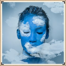 Add a classy frame to the artistic photo of the blue colored makeup girl