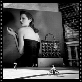 Add a film edge frame to a movie photo of a stylish female