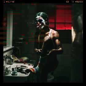 Add a film edge frame to a photo of a clown