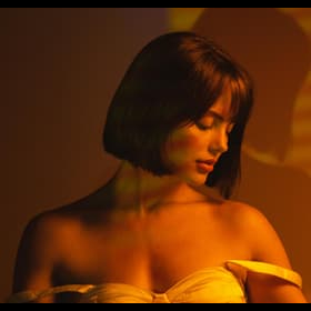 Add a film edge frame to a photo of a pretty girl