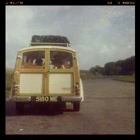 Add a film edge frame to an old photo of a yellow car