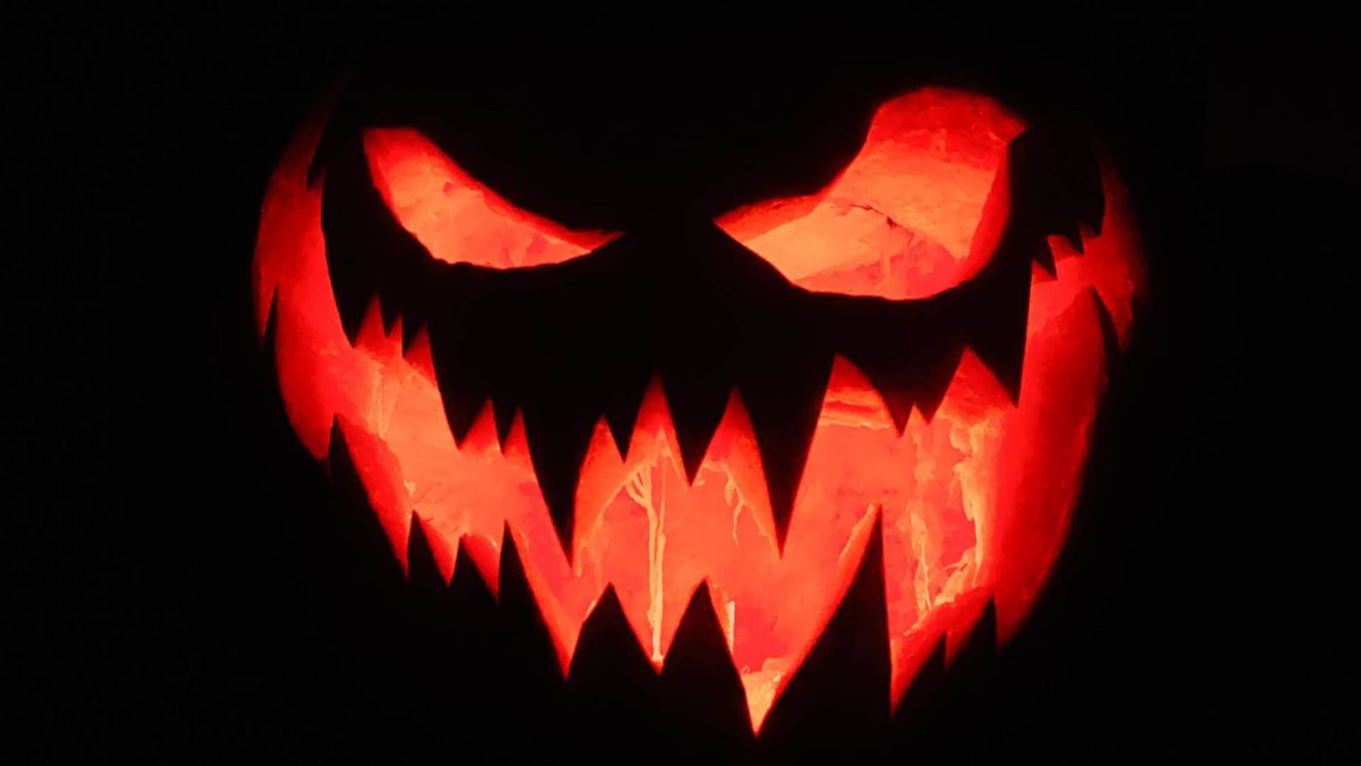 Scary pumpkin face wallpaper or Halloween