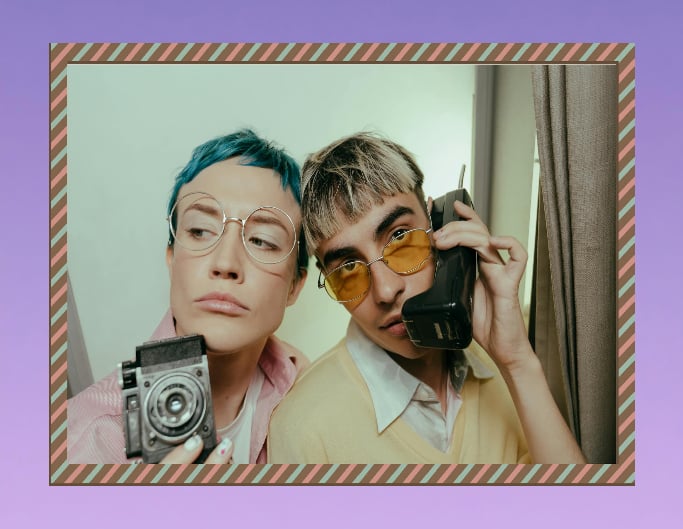 Add a funky frame to a photo of two people posing in a cool way
