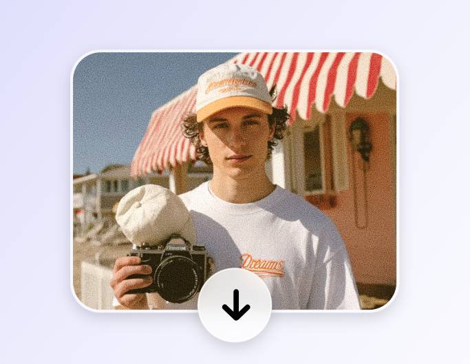Download the photo of a man holding a camera with the grain filter applied