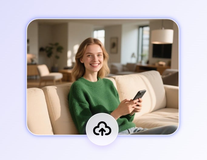 Importer une photo d'une femme en pull vert assise sur le canapé