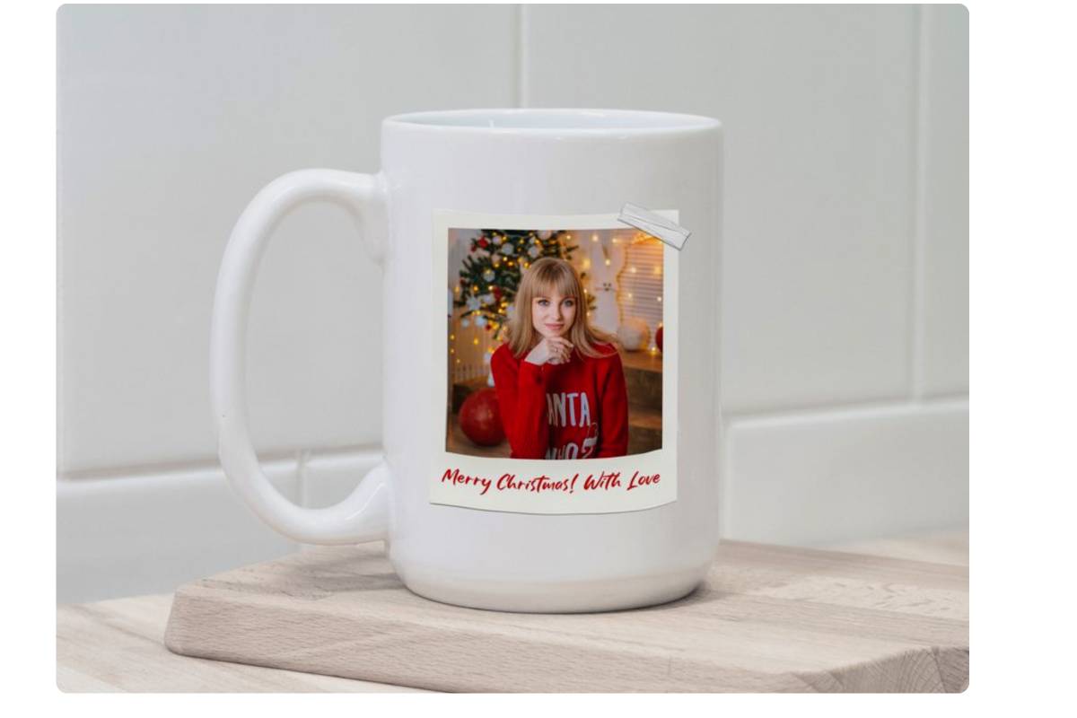 https://imgv3.fotor.com/images/side/white-mug-with-red-sweater-girl-image-on-the-table.jpg