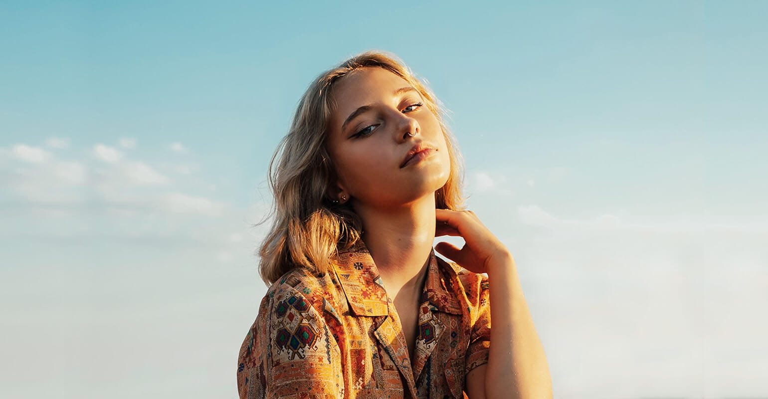 A clear close up photo of a woman