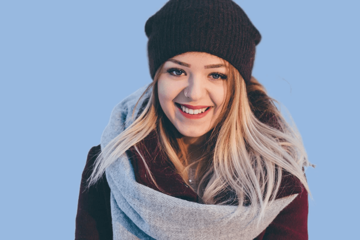 Before image of a female portrait with blue background