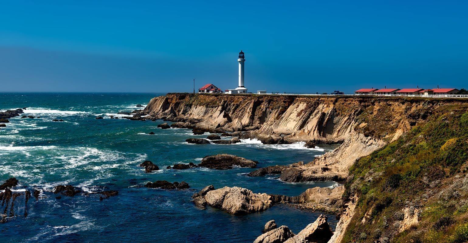 Seaside lighthouse landscape image sharpened and enhanced with better clarity and details by Fotors free online image sharpener