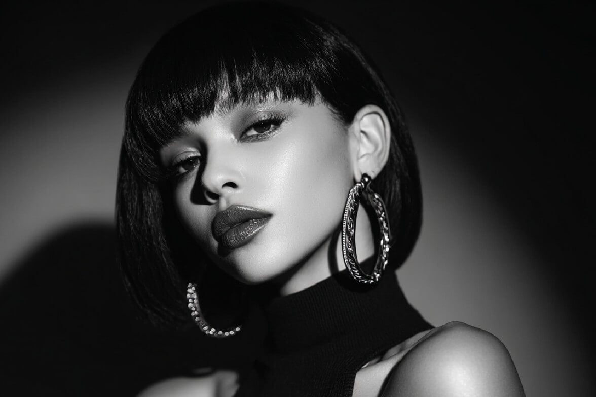 A grayscale image of a handsome woman with a grayscale filter applied