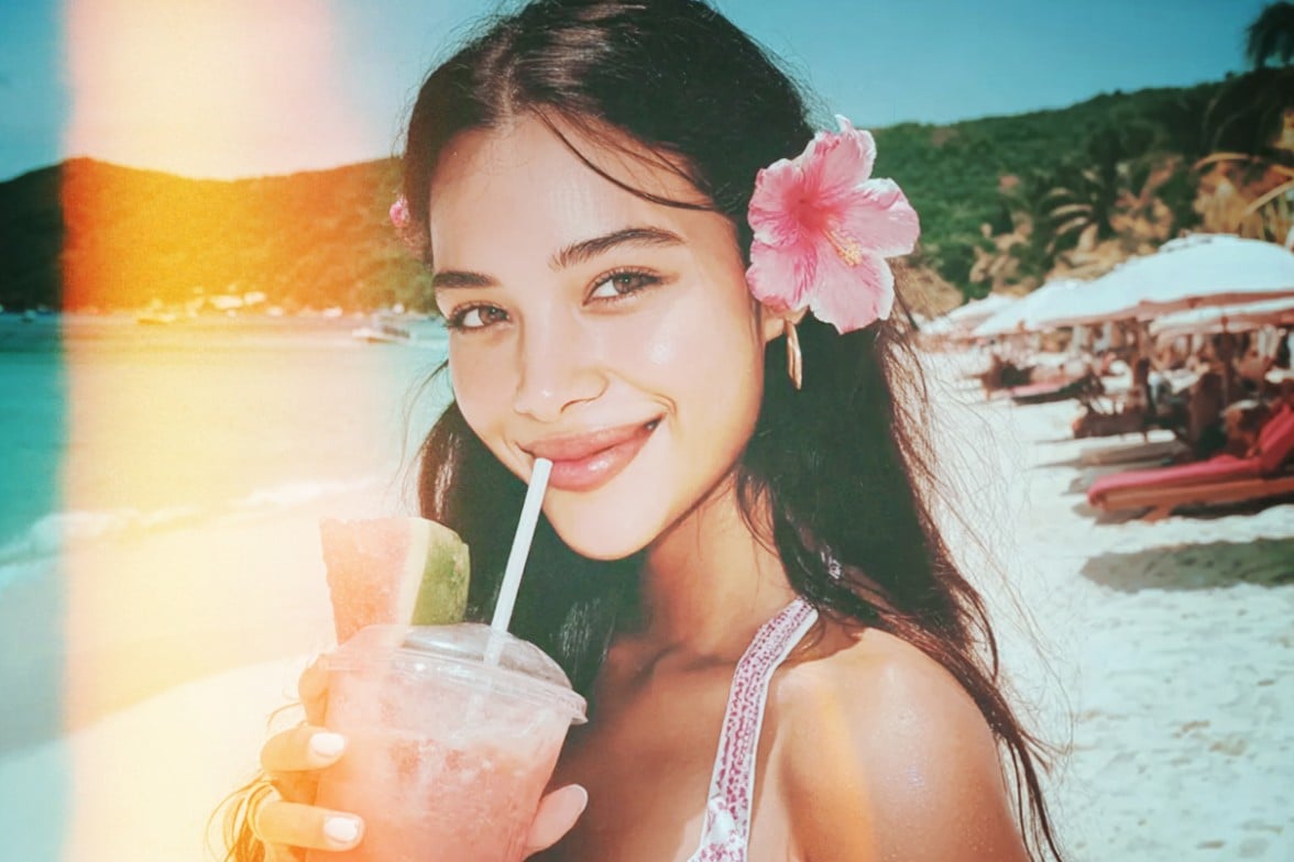 A picture of a girl on the beach with a yellow tint filter