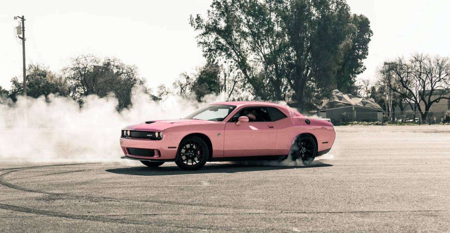 A pink car on the ground