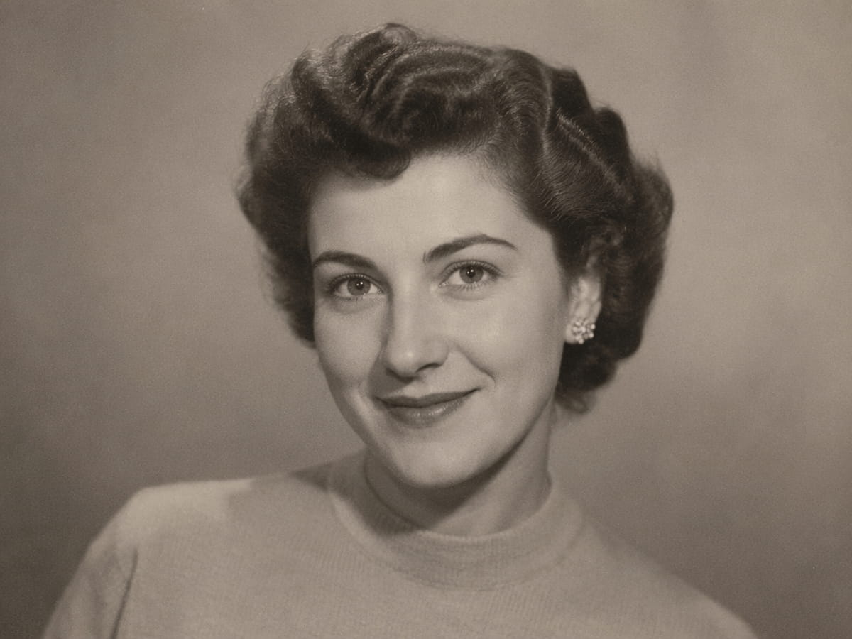 A yellowed portrait of a beautiful woman